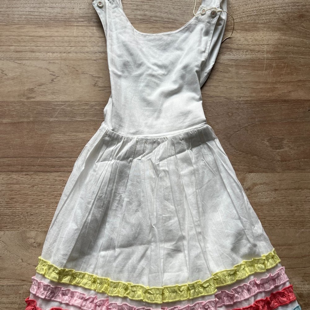 Never worn - Tag almost still on - you can see the string from the tag